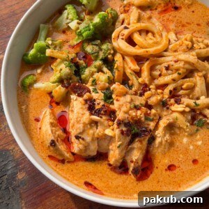 a close up image of peanut butter ramen noodles to showcase its color and texture
