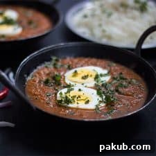 egg curry garnished with coriander