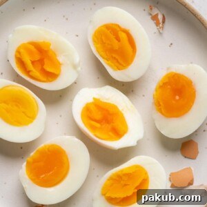 Different varieties of hard boiled eggs on a plate