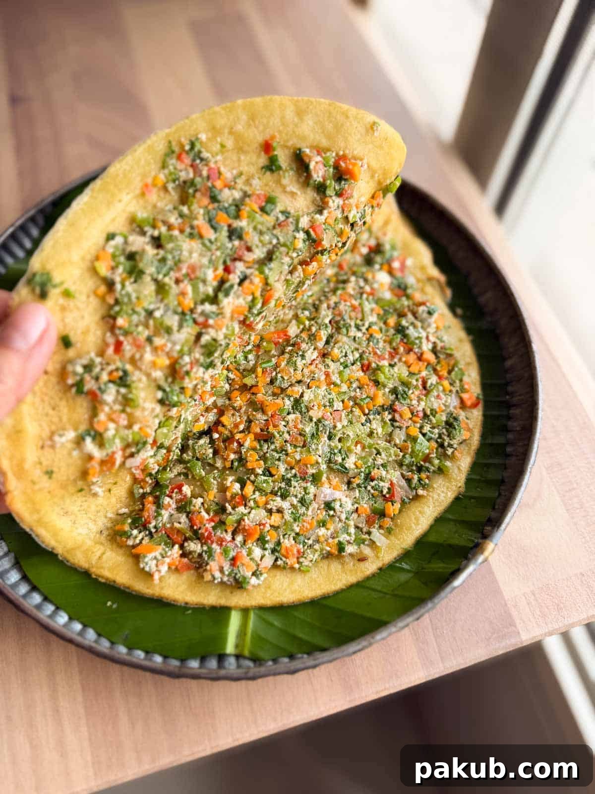 Protein-Packed Moong Dal Chilla with Savory Filling 5 A picture showing the stuffing inside the moong dal chilla