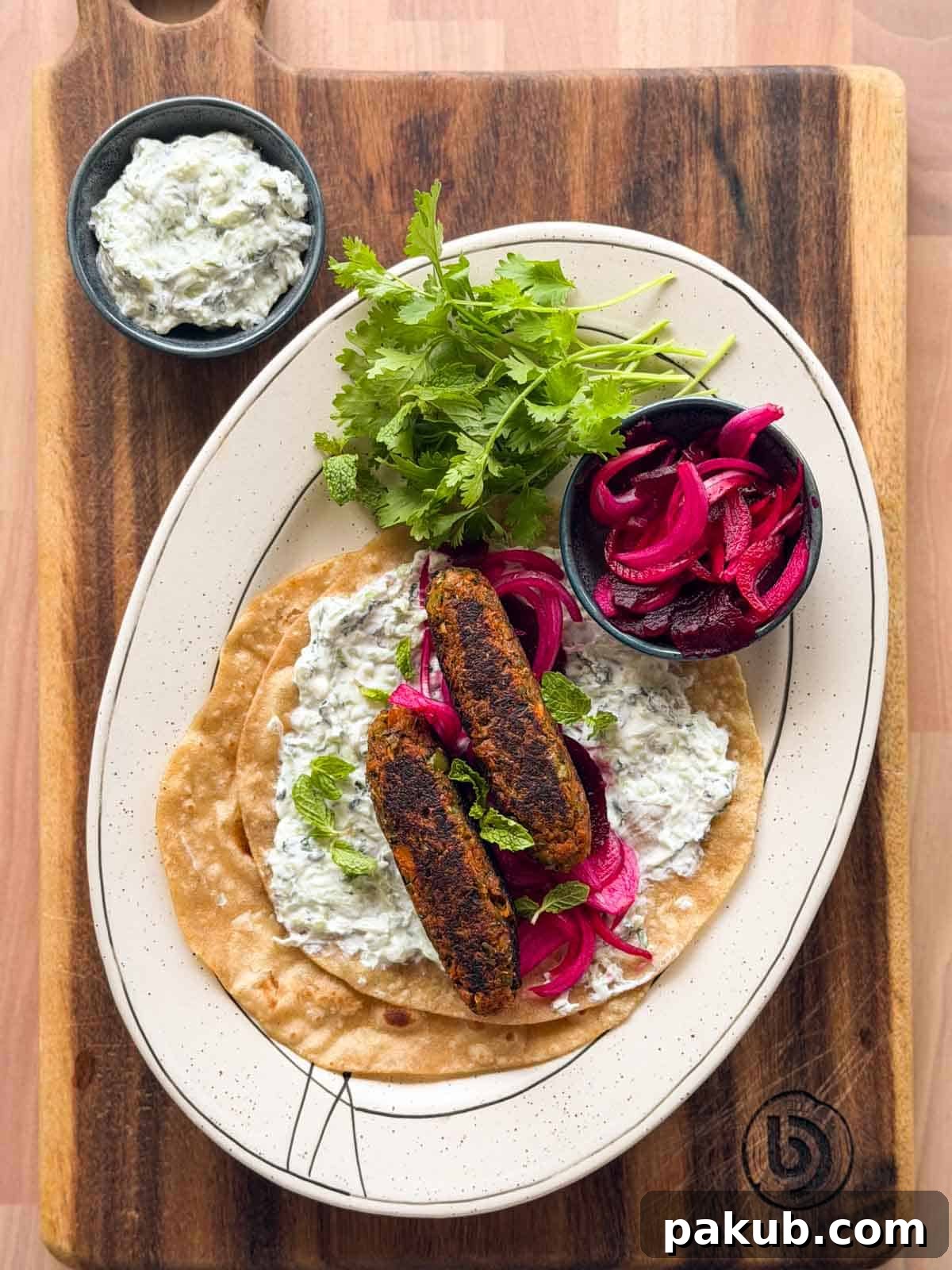 High-Protein Vegetarian Seekh Kebab Recipe for Muscle-Building 2 an image of veg seekh kebabs served on a roti with accompaniments