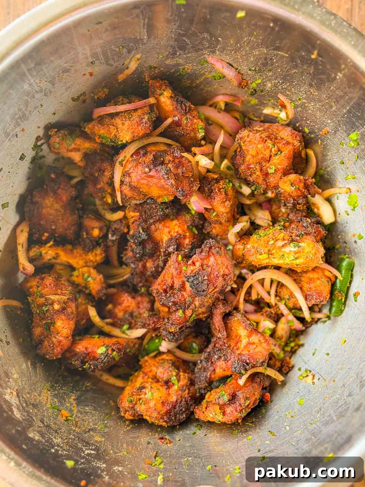 Air Fryer Chatpata Chicken Bites: Crisp Tangy Flavor 2 chatpata chicken bites ready to be served
