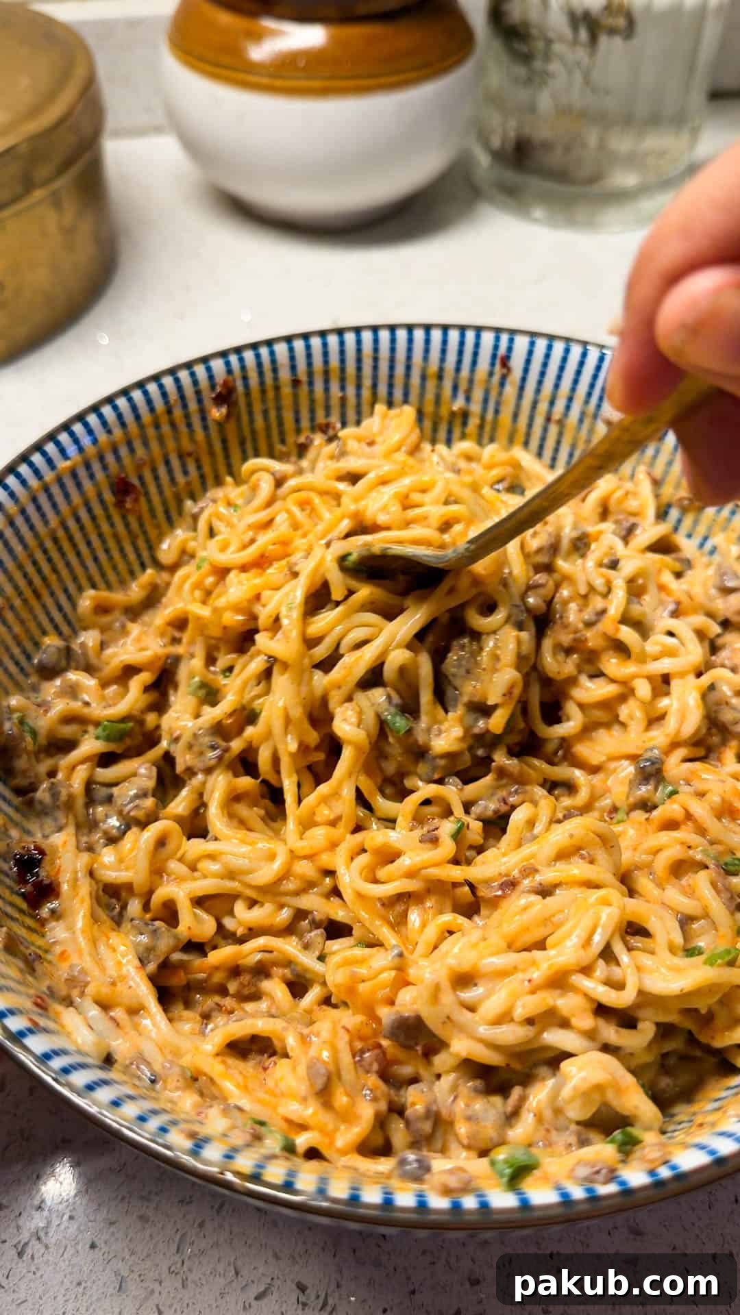Creamy chilli tofu noodles in a bowl