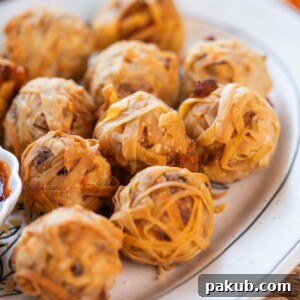 a close up image of firecracker crispy potato balls to showcase it's texture