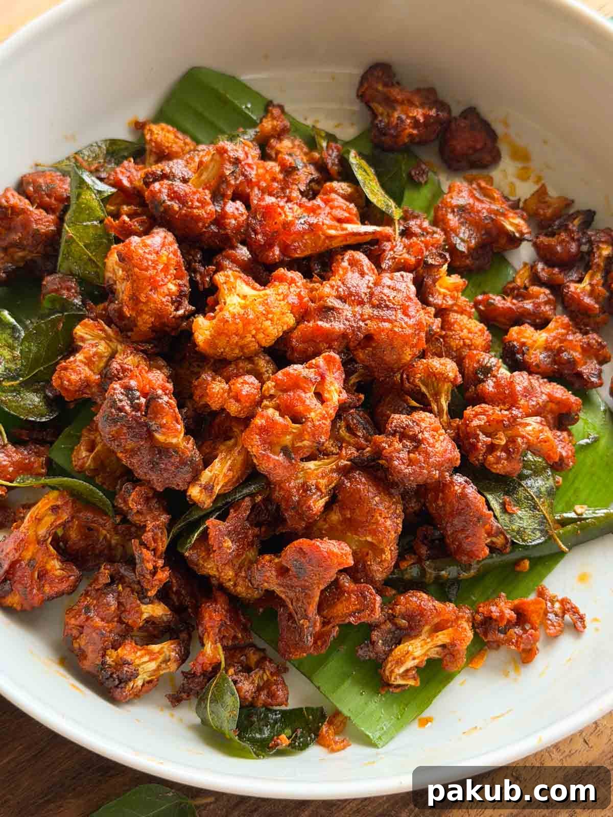Air Fryer Gobi 65: Spicy Crispy Cauliflower Recipe 3 a close up image air fryer gobi 65 to showcase it's color and texture