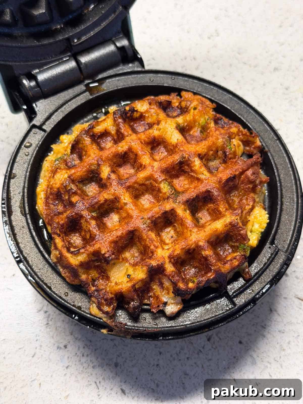 Crispy Hash Brown Waffles Recipe 2 crispy potato waffle still in the waffle maker