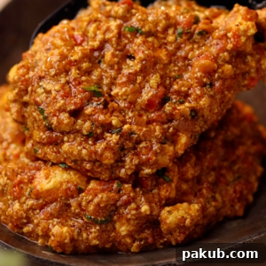 a close up shot amritsari paneer bhurji being served on a plate