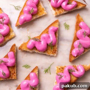 an image of several paneer toasts served on a round white platter