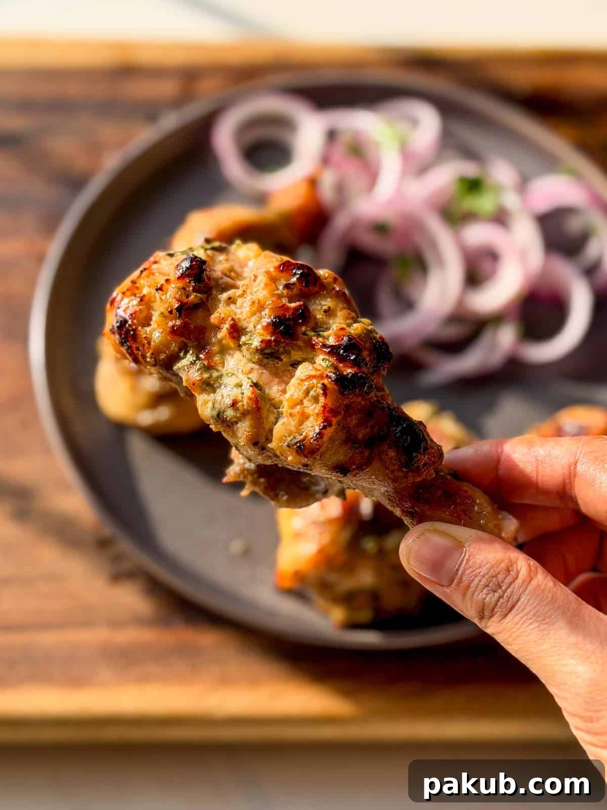 Creamy Malai Chicken Tikka Made in the Air Fryer 3 a close up image of air fryer malai chicken tikka to showcase it's color and texture