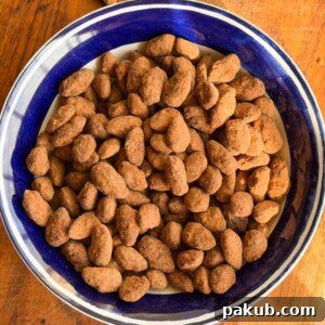 chocolate covered almonds in a bowl